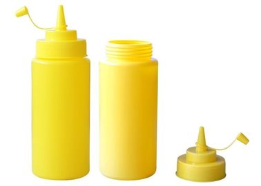 Las botellas plásticas de la salsa del amarillo de la categoría alimenticia con la salsa capsulan, exprimen la botella de la salsa