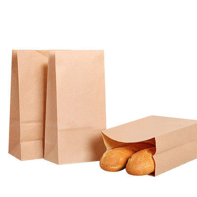 El papel de Kraft reciclado se lleva entrega de empaquetado de la comida de los bolsos del restaurante
